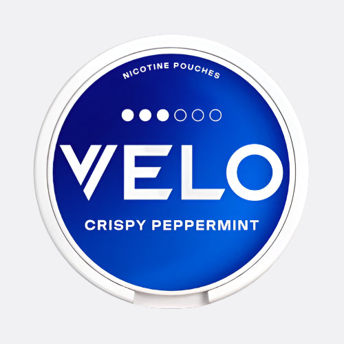 Velo Crispy Peppermint nicotine pouches packaging on a black background